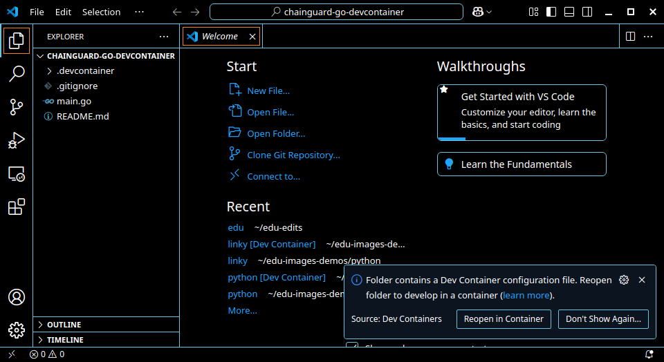 Screenshot of a VS Code window showing the prompt to reopen the project in a dev container.